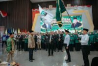 pengibaran bendera organisasi prosesi pelantikan Majelis Wilayah KAHMI dan FORHATI Lampung periode 2026-2031 di Mahan Agung,