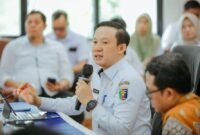 Sekretaris Daerah Provinsi Lampung memberikan arahan saat memimpin Entry Meeting Penugasan Pengawasan Sektor Ketahanan Pangan Triwulan III Tahun 2026 di Aula Perwakilan BPKP Provinsi Lampung, Bandar Lampung