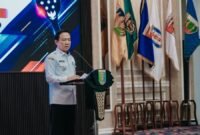 Sekda Lampung memberikan sambutan dalam Pengukuhan Pengurus PBPI Lampung 2025-2029 di Kantor Gubernur
