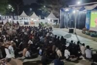 Ratusan warga memadati area Pasar Kreatif dan Seni PKOR Way Halim, Bandar Lampung, untuk menyaksikan nonton bareng Piala Dunia FIFA 2026