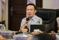 Sekdaprov Lampung memimpin Rapat Evaluasi Retribusi Daerah Semester I Tahun 2026 di Ruang Rapat Sakai Sambayan, Kantor Gubernur Lampung, Rabu (22/7/2026)