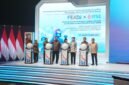 Sejumlah pejabat menekan tombol tanda dibukanya FEKDI x IFSE 2026 yang dirangkaikan dengan Rapat Koordinasi Nasional Pengendalian Inflasi serta Percepatan dan Perluasan Digitalisasi Daerah (P2DD) 2026 di Jakarta.