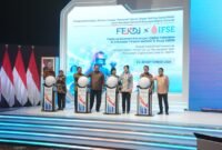 Sejumlah pejabat menekan tombol tanda dibukanya FEKDI x IFSE 2026 yang dirangkaikan dengan Rapat Koordinasi Nasional Pengendalian Inflasi serta Percepatan dan Perluasan Digitalisasi Daerah (P2DD) 2026 di Jakarta.