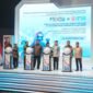 Sejumlah pejabat menekan tombol tanda dibukanya FEKDI x IFSE 2026 yang dirangkaikan dengan Rapat Koordinasi Nasional Pengendalian Inflasi serta Percepatan dan Perluasan Digitalisasi Daerah (P2DD) 2026 di Jakarta.