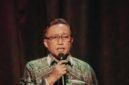 Kepala Dinas Kominfotik Provinsi Lampung Ganjar Jationo menyampaikan amanat tertulis Gubernur Lampung Rahmat Mirzani Djausal saat membuka Seminar Pekan Tuli Internasional 2026, Sabtu (26/9/2026).