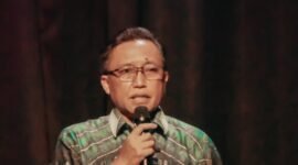 Kepala Dinas Kominfotik Provinsi Lampung Ganjar Jationo menyampaikan amanat tertulis Gubernur Lampung Rahmat Mirzani Djausal saat membuka Seminar Pekan Tuli Internasional 2026, Sabtu (26/9/2026).