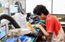 Salah satu kompetitor vokasi Indonesia fokus menyelesaikan tantangan pengerjaan perangkat elektronik pada ajang WorldSkills Competition (WSC) Shanghai 2026.