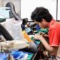 Salah satu kompetitor vokasi Indonesia fokus menyelesaikan tantangan pengerjaan perangkat elektronik pada ajang WorldSkills Competition (WSC) Shanghai 2026.