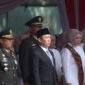 Suasana khidmat para tamu undangan, termasuk jajaran Pemerintah Provinsi Lampung dan unsur Forkopimda, saat mengikuti Upacara Peringatan HUT ke-81 TNI Tahun 2026 yang mengusung tema 