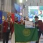 Foto tim mahasiswa PBA UMY yang membuat aplikasi Tarkeeb saat berhasil menjuarai KMI Expo XVII 2026 kategori Bisnis Digital
